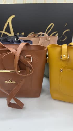 Rs 2550 pair hand bag [ mustard]